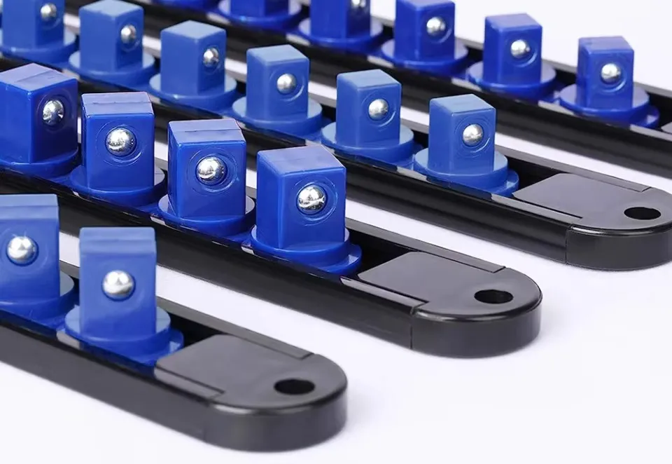 Blue swivel socket clips lined up along three black rails